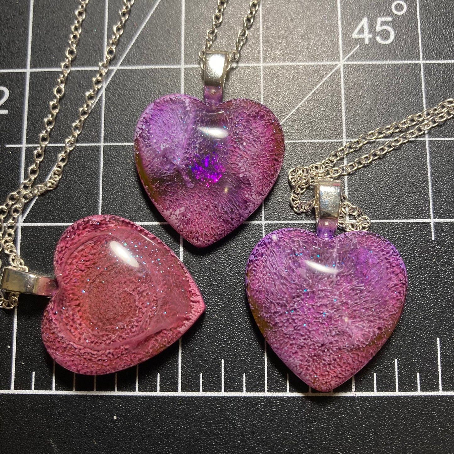 Heart pendants, pink/purple
