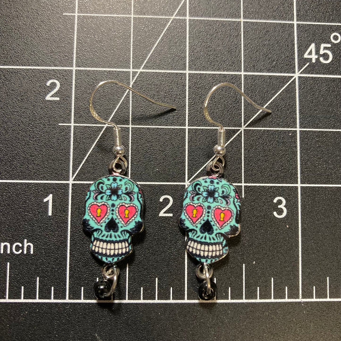 Sugar skulls earrings with black bead
