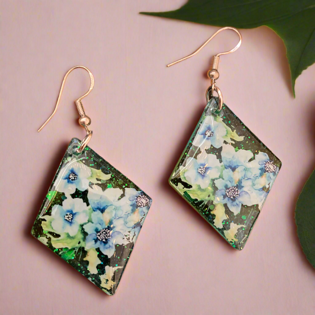 Floral drop earrings, green and blue