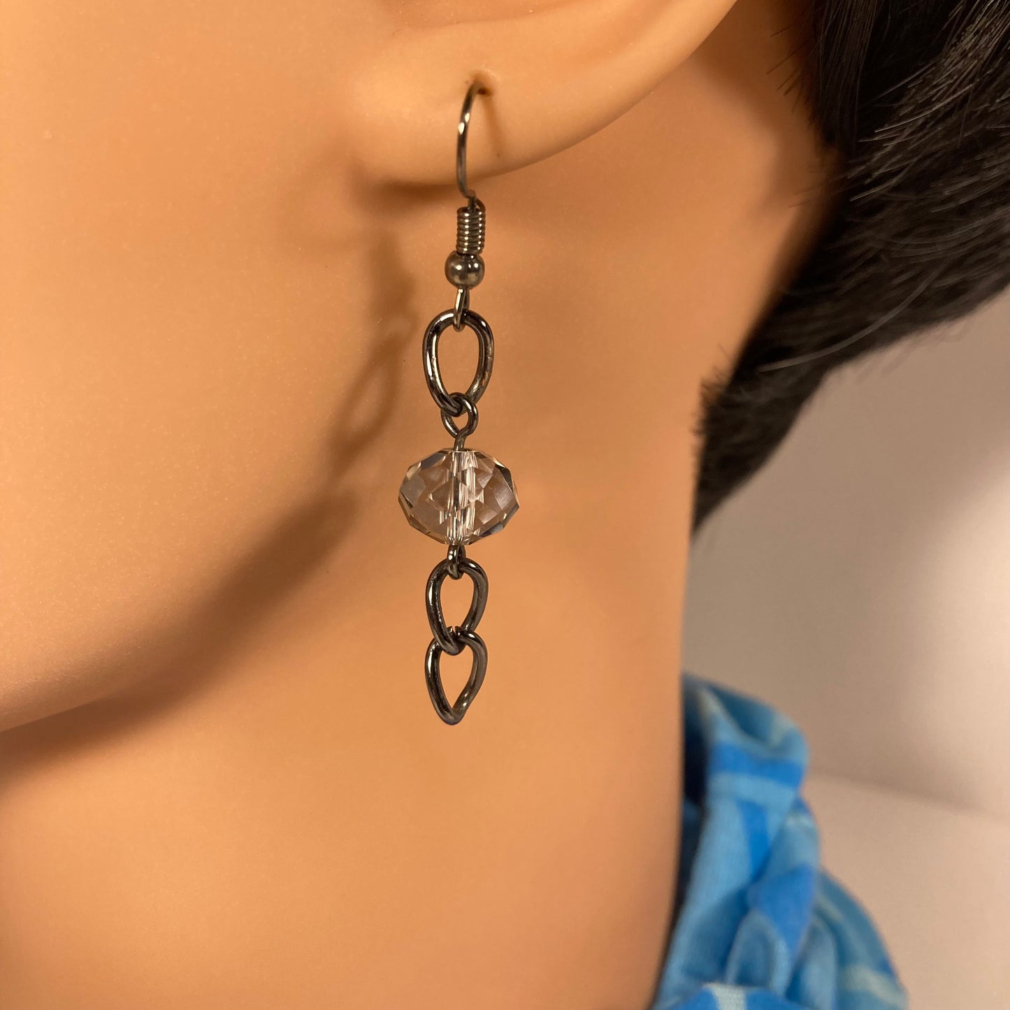 Beaded earrings on a dark silver chain