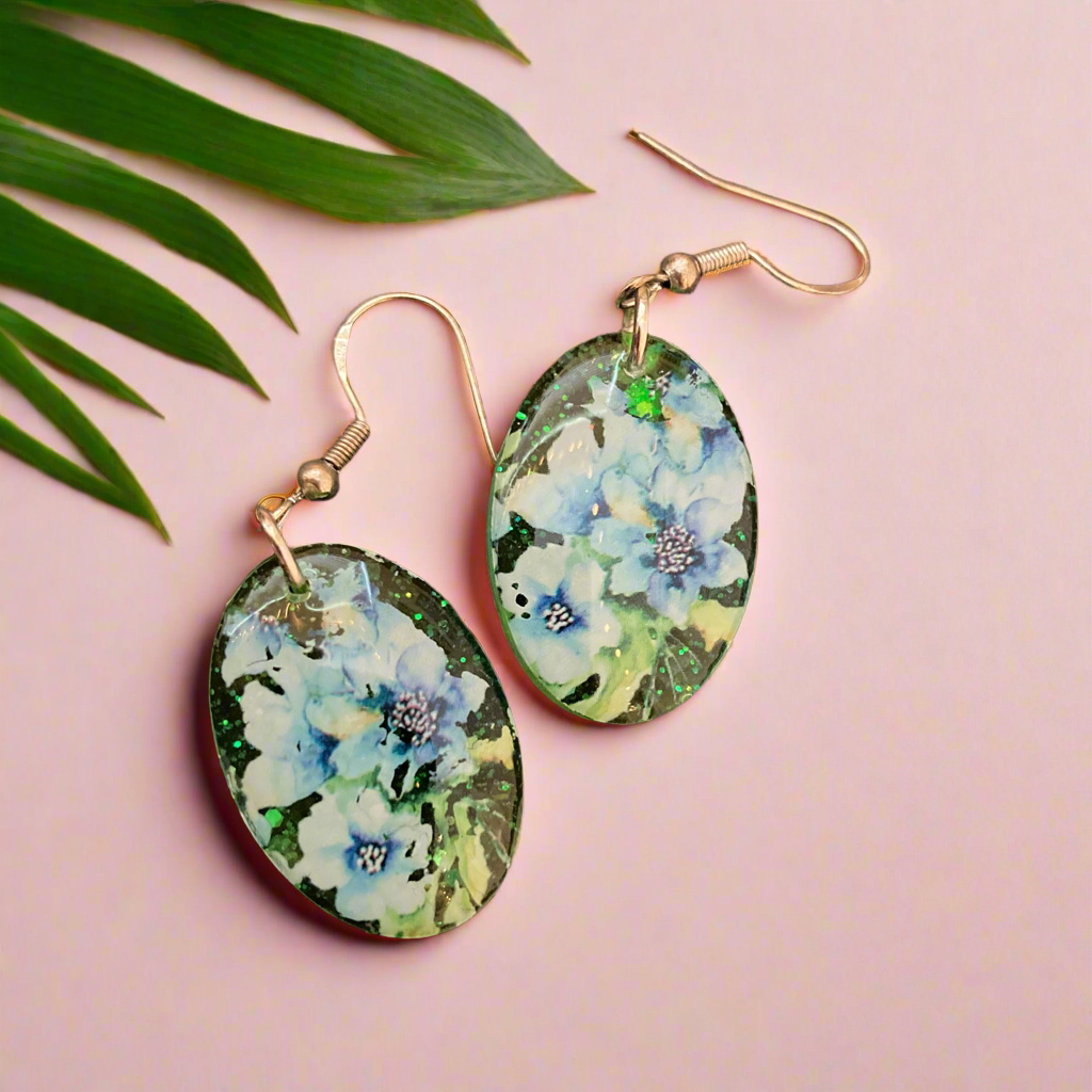 Floral drop earrings, green and blue