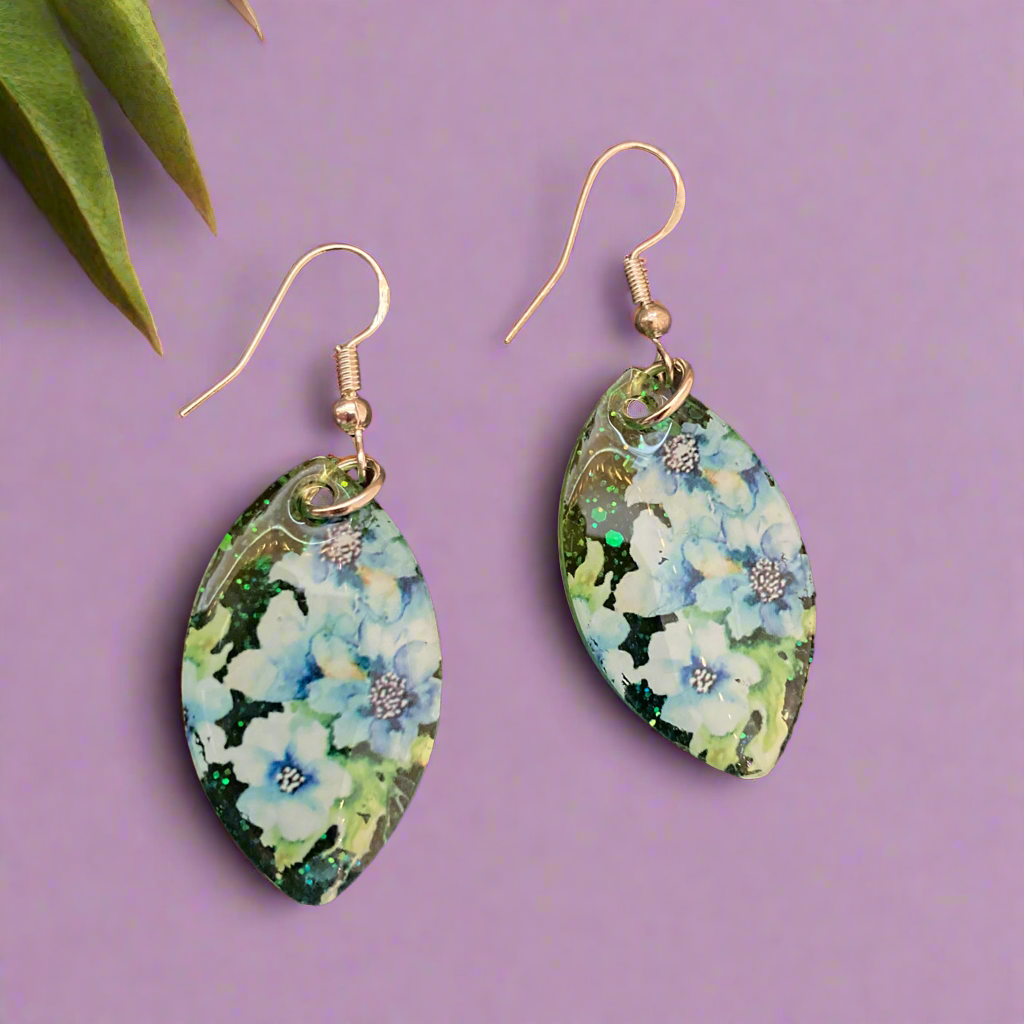 Floral drop earrings, green and blue