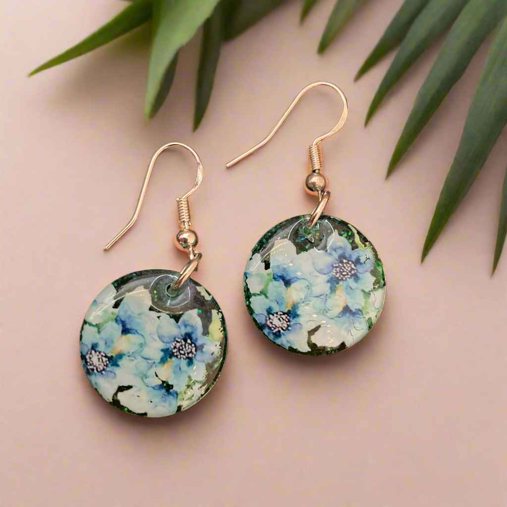Floral drop earrings, green and blue