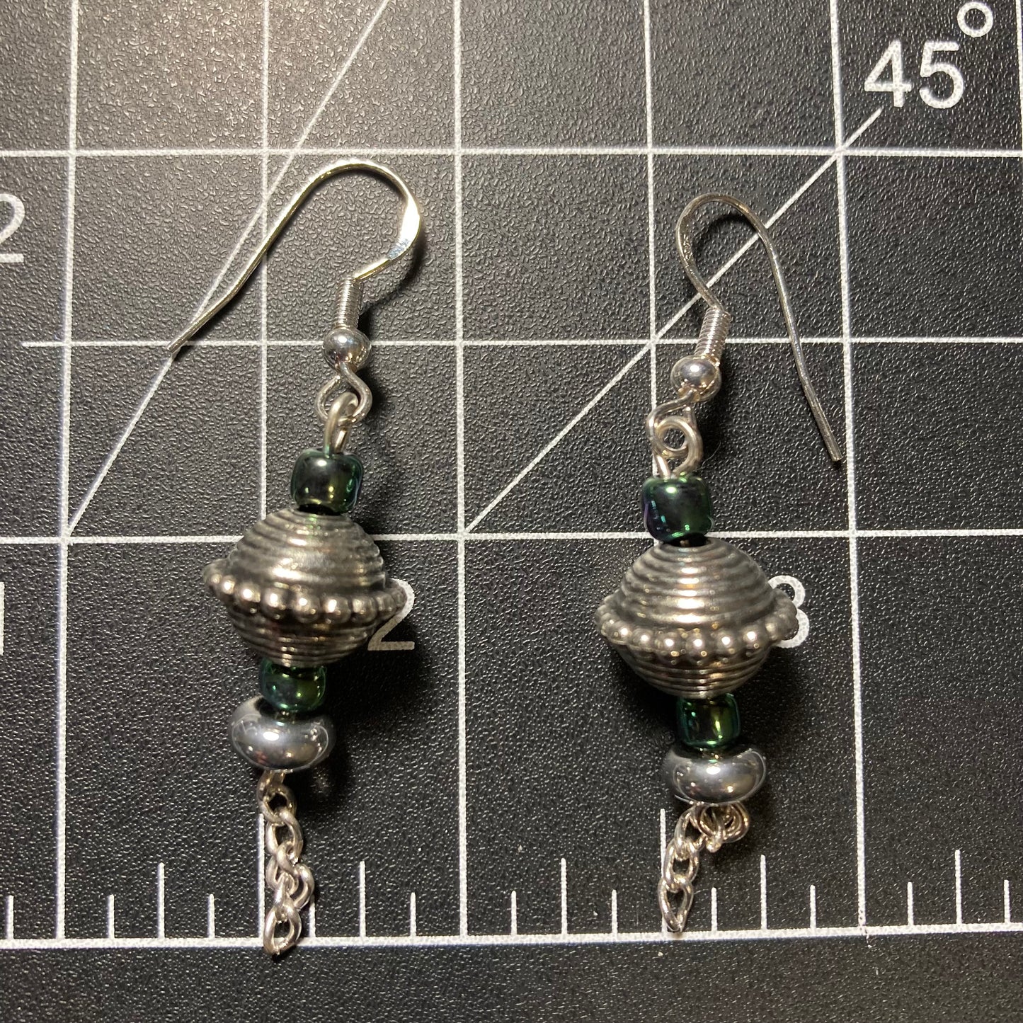 Silver earrings with chameleon colored beads and chains