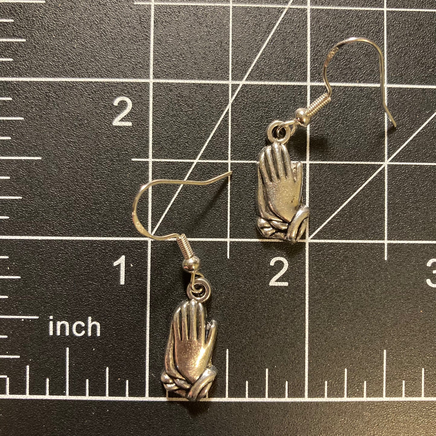 Praying hands earrings