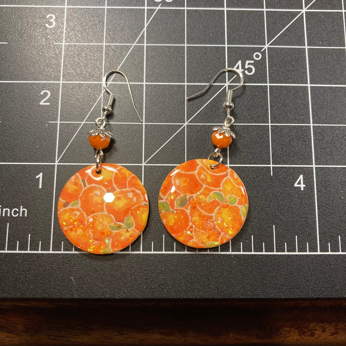 Paper earrings, orange bunch