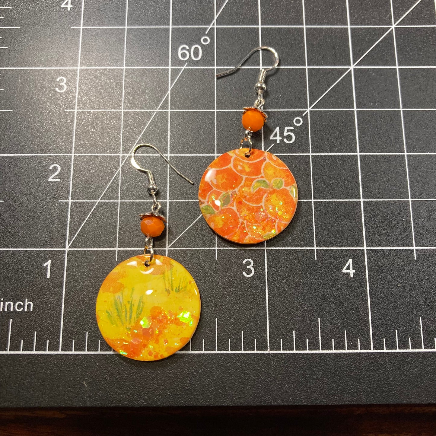 Paper earrings, orange bunch