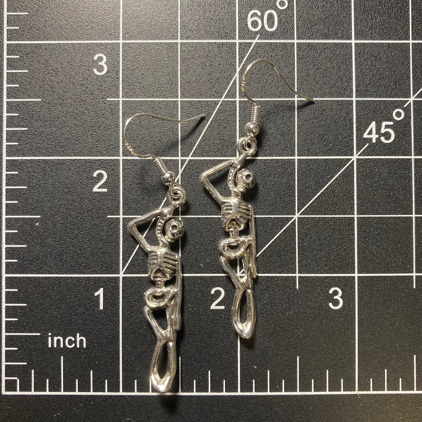 Halloween earrings, skeleton hung on a rope