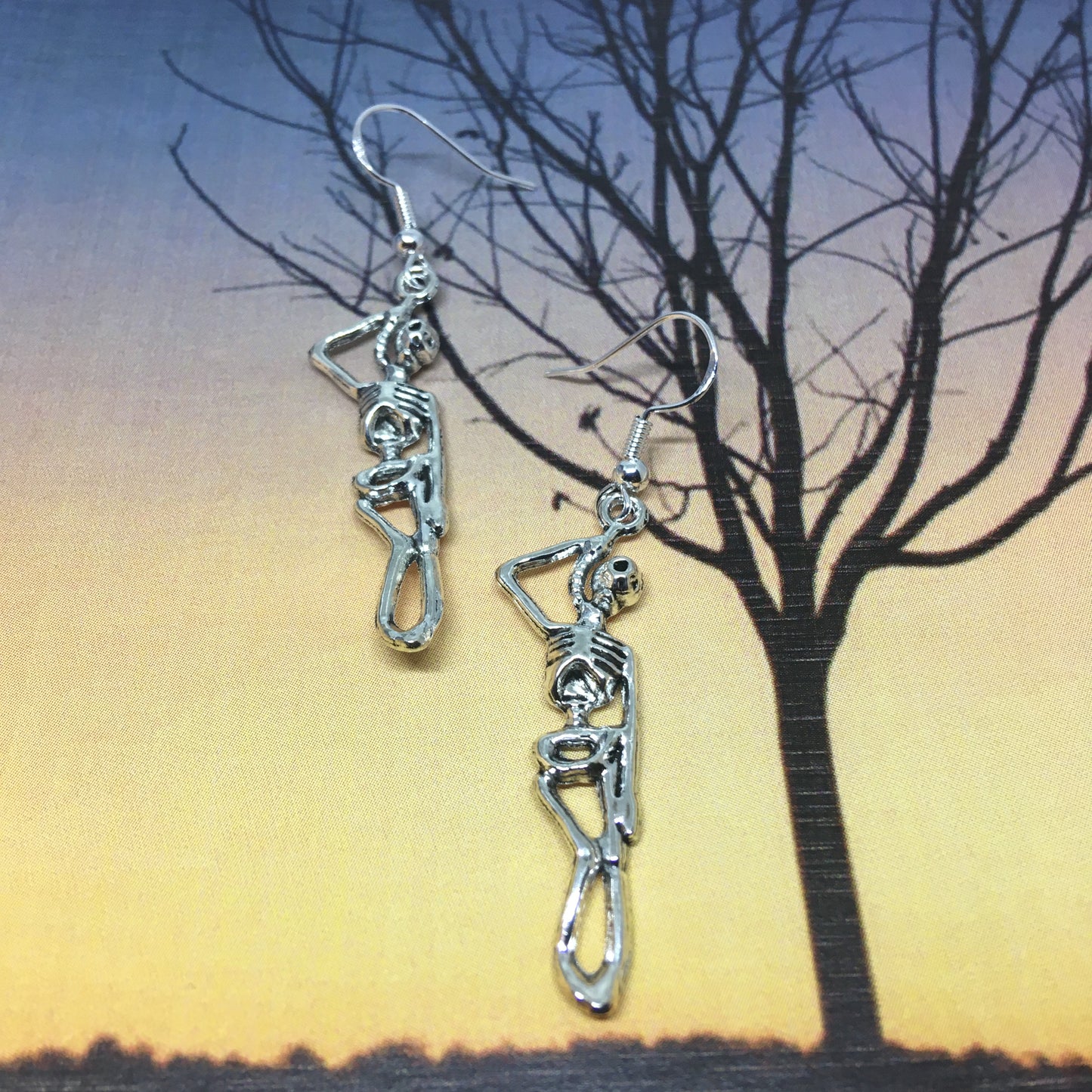 Halloween earrings, skeleton hung on a rope