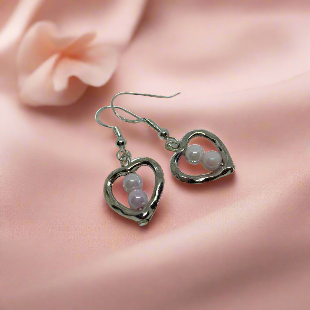 Silver Hearts dangle earrings with pearls