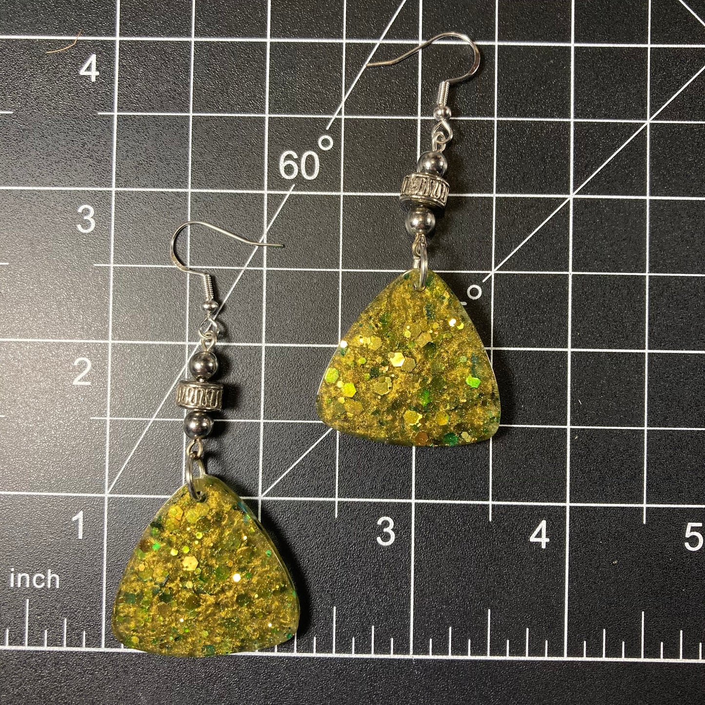 Green guitar pick earrings