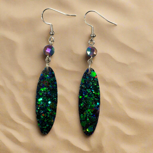 Green elliptical earrings