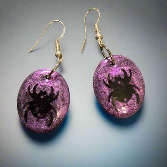 Purple spider earrings