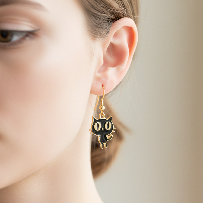 Big eyed cat earrings