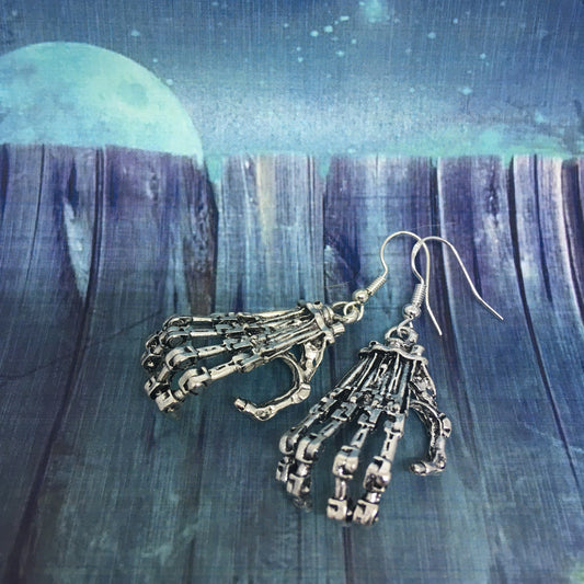 Skeleton Hand Grip Earrings